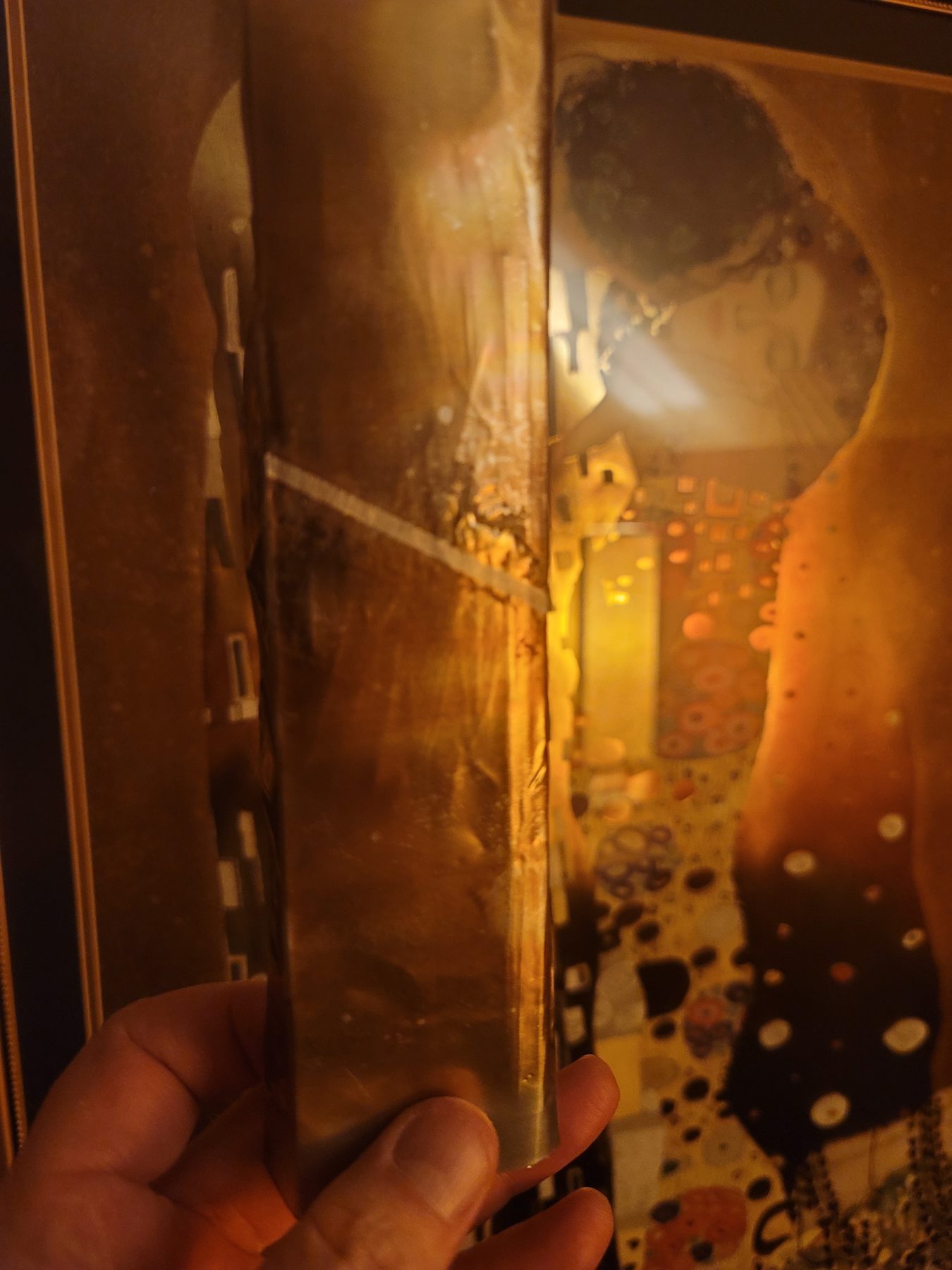 Smoke and heat toned aluminum detail with warm golden surface